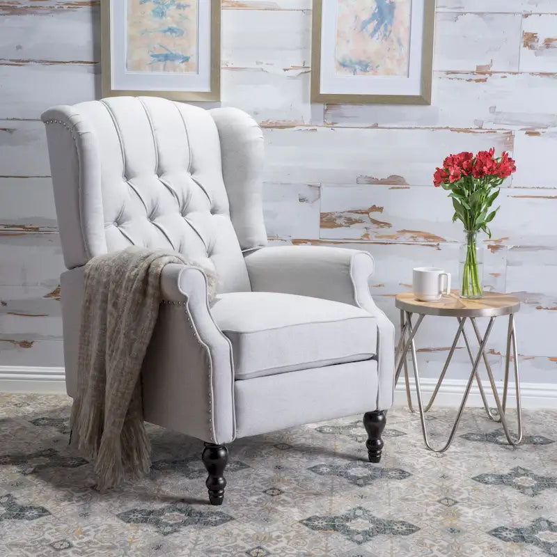 Fauteuil club capitonné en velours