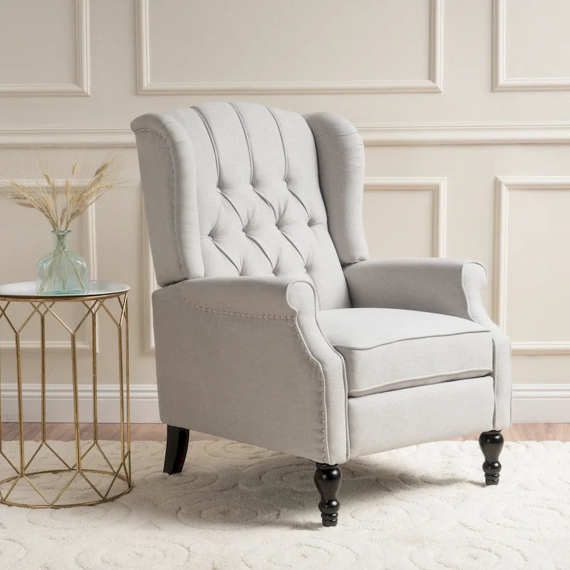 Fauteuil club capitonné en velours