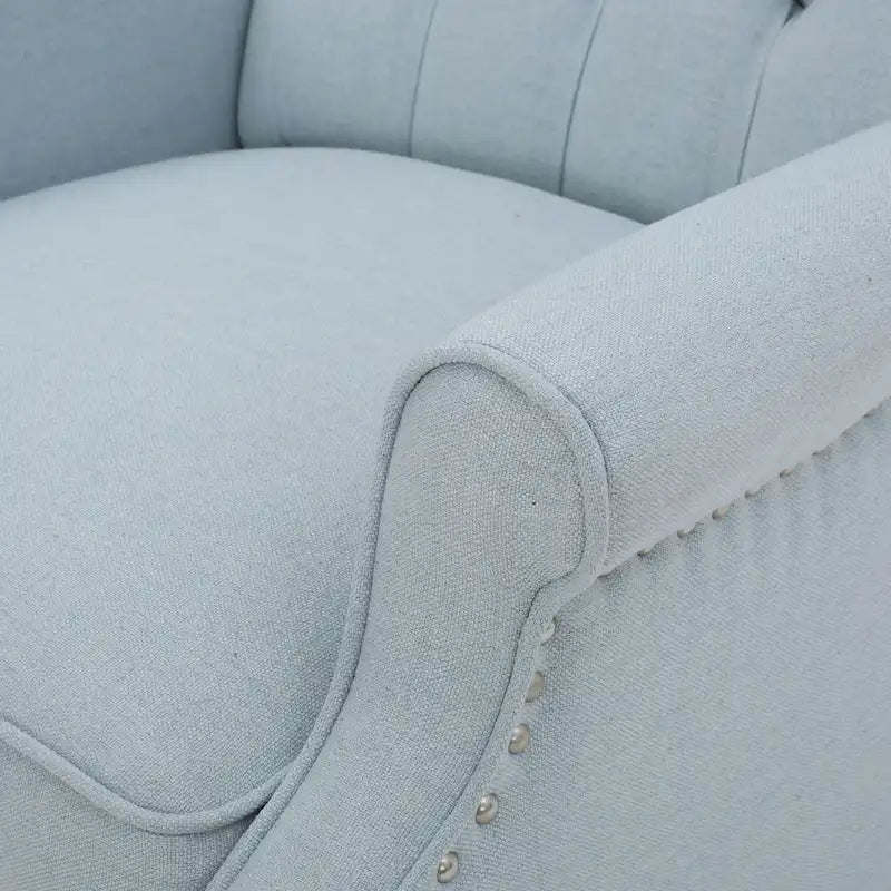Fauteuil club capitonné en velours