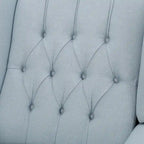 Fauteuil club capitonné en velours