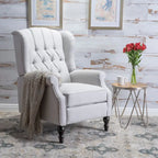 Fauteuil club capitonné en velours