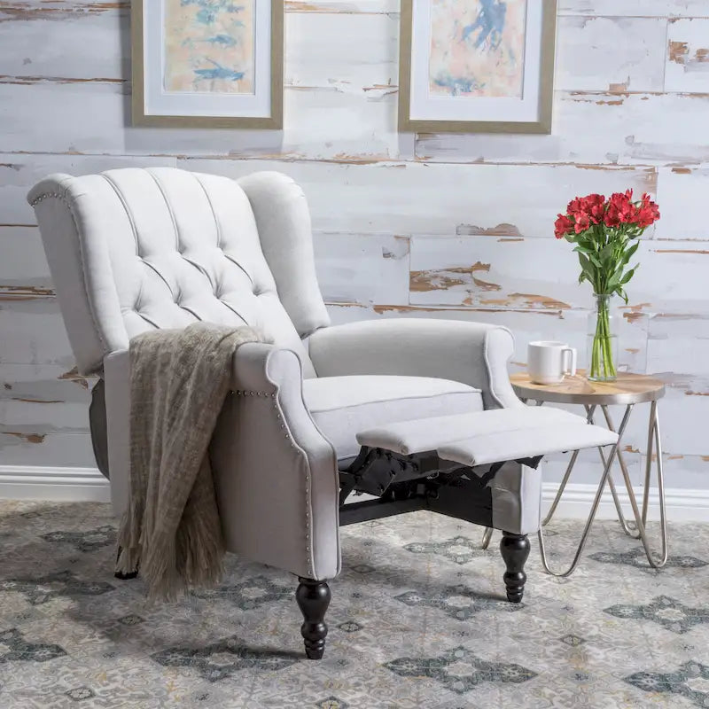 Fauteuil club capitonné en velours