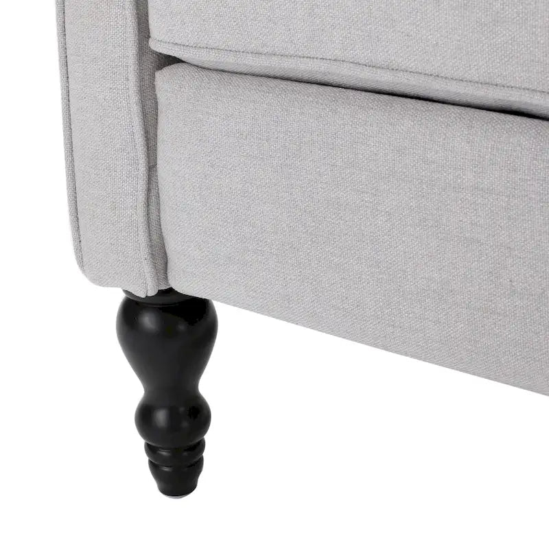 Fauteuil club capitonné en velours