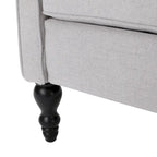 Fauteuil club capitonné en velours